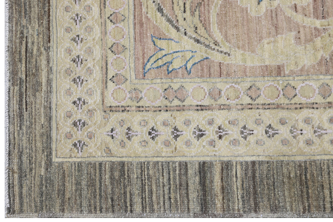 Authentic hand-knotted oversized Ariana Transitional wool area rug featuring a subtle purple, luminous yellow, and ivory palette