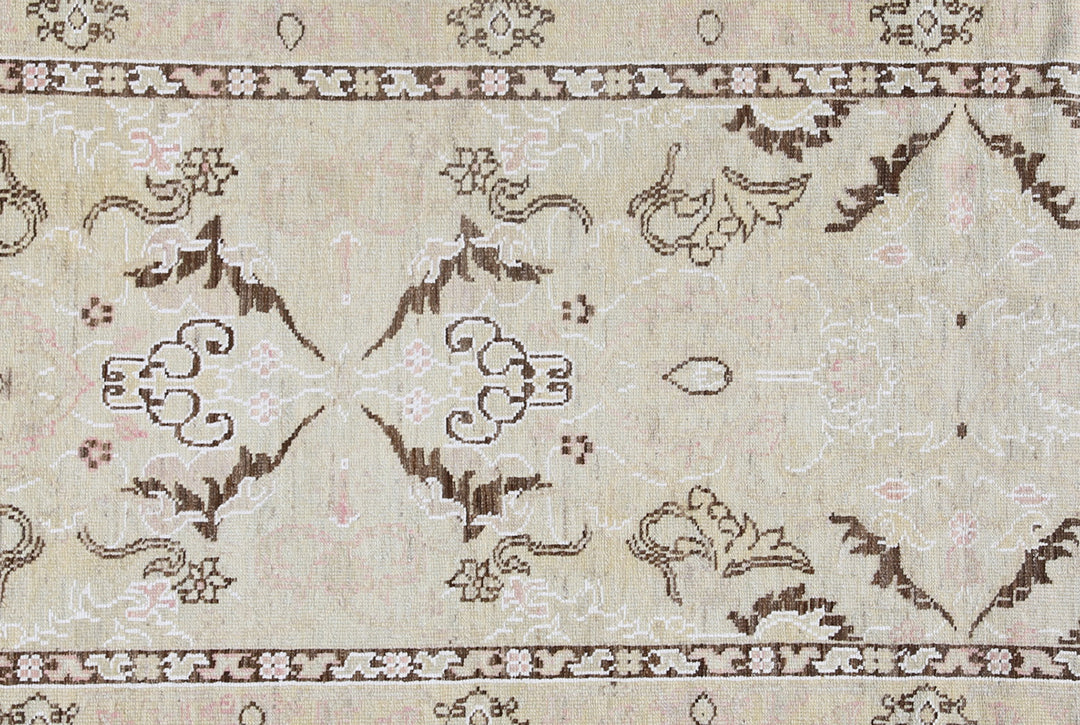 Over-the-shoulder detailed view of an authentic 8'4" x 2'8" Ariana transitional wool hand-knotted runner rug with intricate modern-classic patterns.