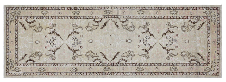 Over-the-shoulder detailed view of an authentic 8'4" x 2'8" Ariana transitional wool hand-knotted runner rug with intricate modern-classic patterns.