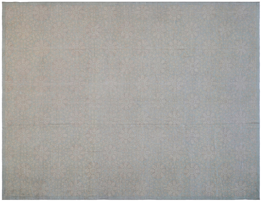 Hand-knotted 9x12 Ariana Vintage wool rug with European design patterns in soft turquoise and ivory