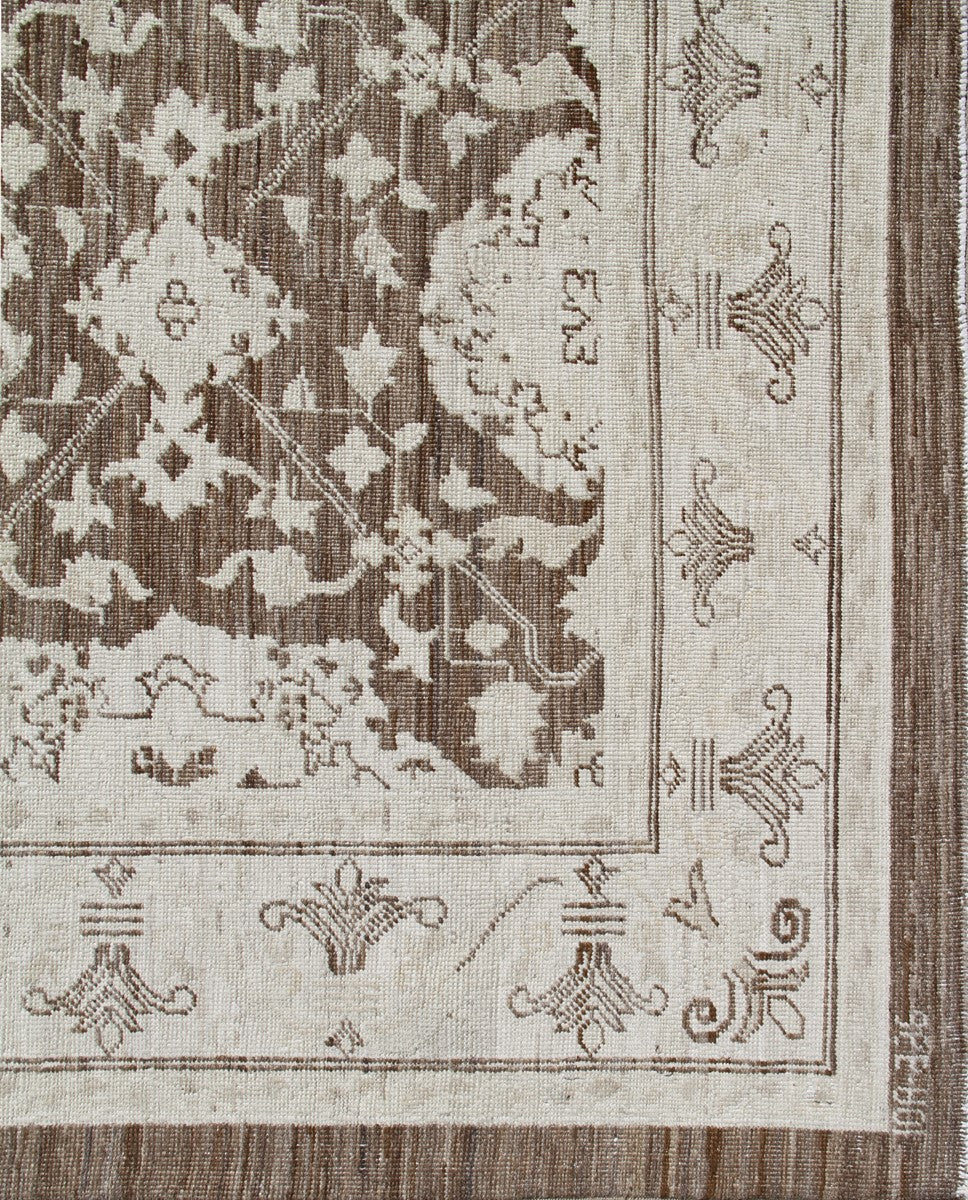 Authentic fine hand-knotted Afghan area rug from the Ariana Traditional Collection, featuring the Agra 505 design in a low-pile organic brown wool weave.