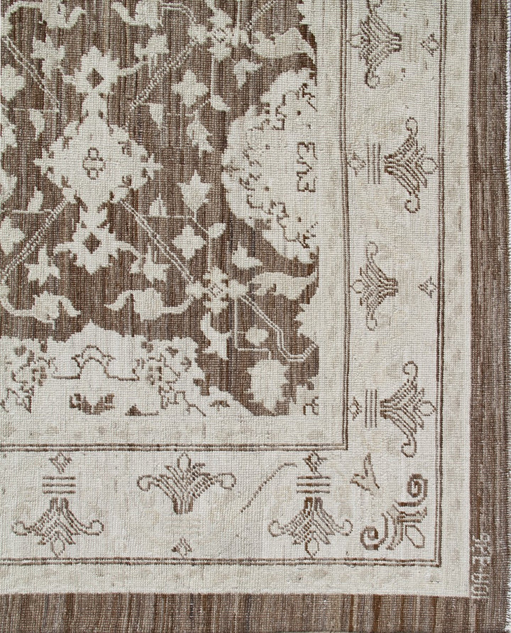 Authentic fine hand-knotted Afghan area rug from the Ariana Traditional Collection, featuring the Agra 505 design in a low-pile organic brown wool weave.