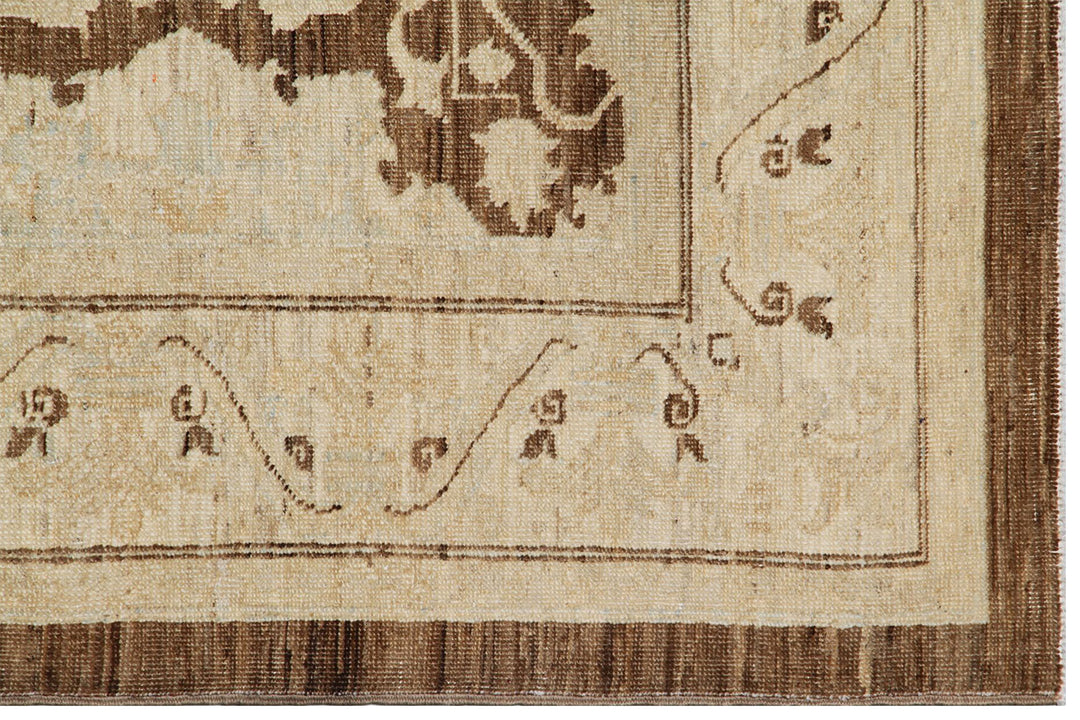 Authentic fine hand-knotted Afghan area rug from the Ariana Transitional Collection, featuring the Agra 505 design in low-pile brown and ivory organic wool.