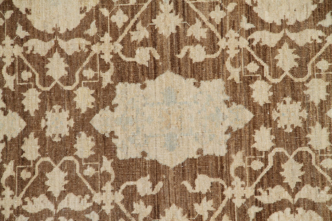 Authentic fine hand-knotted Afghan area rug from the Ariana Transitional Collection, featuring the Agra 505 design in low-pile brown and ivory organic wool.
