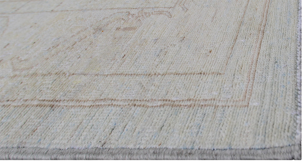 Authentic hand-knotted Afghan runner rug from the Ariana Transitional Collection, featuring the Agra 505 design in low-pile soft blue organic wool.