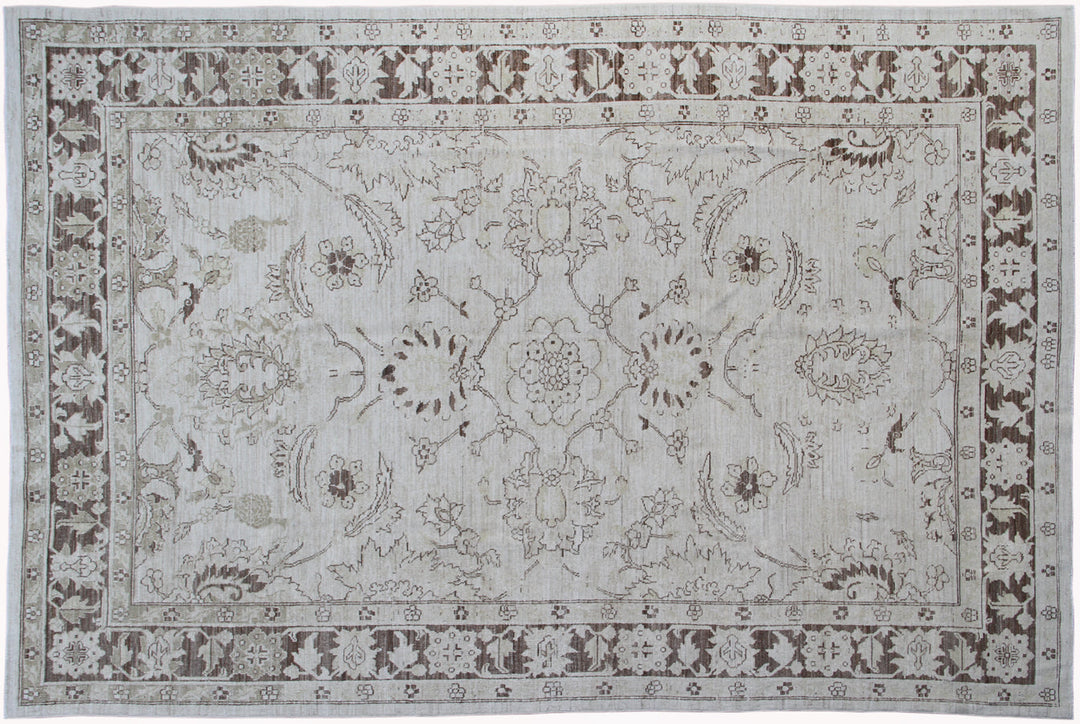 Authentic hand-knotted Afghan area rug from the Ariana Transitional Collection, featuring a Persian Sultanabad floral design on a low-pile ivory background.