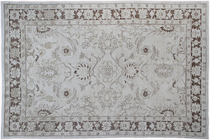 Authentic hand-knotted Afghan area rug from the Ariana Transitional Collection, featuring a Persian Sultanabad floral design on a low-pile ivory background.