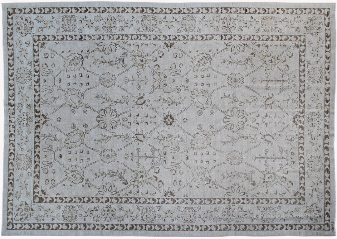 Authentic hand-knotted Afghan area rug from the Ariana Transitional Collection, featuring a classic Tabriz floral design in a low-pile ivory and brown organic wool weave.