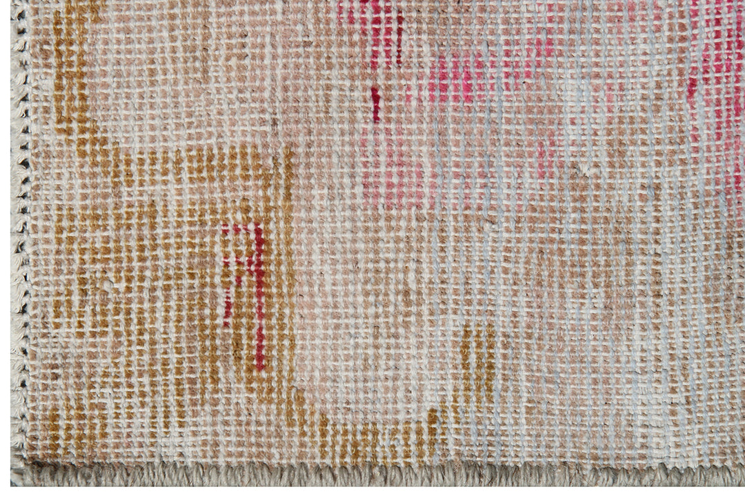 Antique Samarkand wool rug measuring 6'3" x 4'1" featuring a beige and pink color palette with a delicate faded floral design.