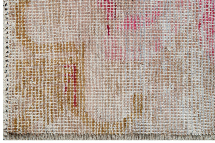 Antique Samarkand wool rug measuring 6'3" x 4'1" featuring a beige and pink color palette with a delicate faded floral design.