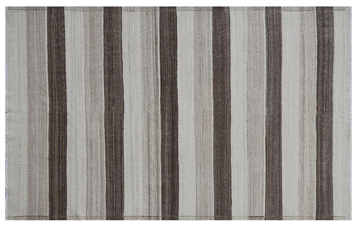 Contemporary living room styled with a 6x9 taupe, brown, and cream striped Afghan wool kilim from Ariana Rugs West Hollywood.