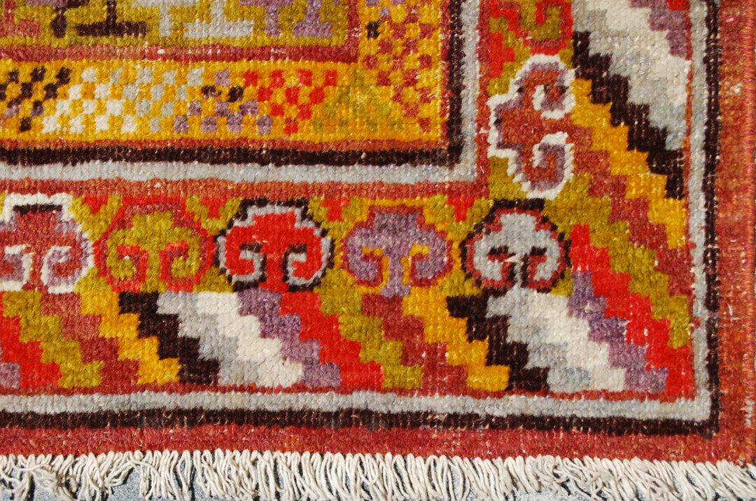 5x10 Fine Handmade Antique Samarkand East Turkestan Wool Area Rug in Bright Red with Multiple Geometric Medallions and Yellow Borders Curated by Ariana Rugs