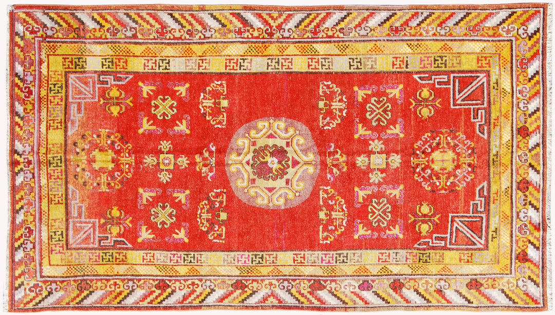 5x10 Fine Handmade Antique Samarkand East Turkestan Wool Area Rug in Bright Red with Multiple Geometric Medallions and Yellow Borders Curated by Ariana Rugs