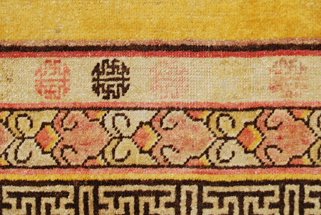 5x7 Fine Handmade Antique Samarkand East Turkestan Wool Area Rug in Rich Yellow Floral Design with Greek Key Border Curated by Ariana Rugs