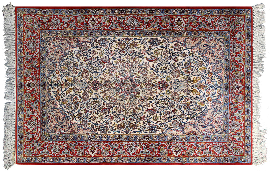 A traditional oriental area rug with an intricate floral and medallion pattern, featuring a red border, cream center, and white fringe on the top and bottom.
