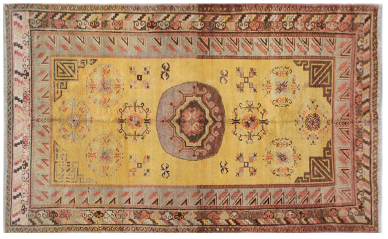 Rare antique hand-knotted Samarkand Khotan wool area rug featuring a central medallion on a unique luminous yellow field