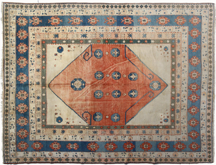 10x12- vintage hand-knotted Turkish wool area rug showing natural wear and subtle patina
