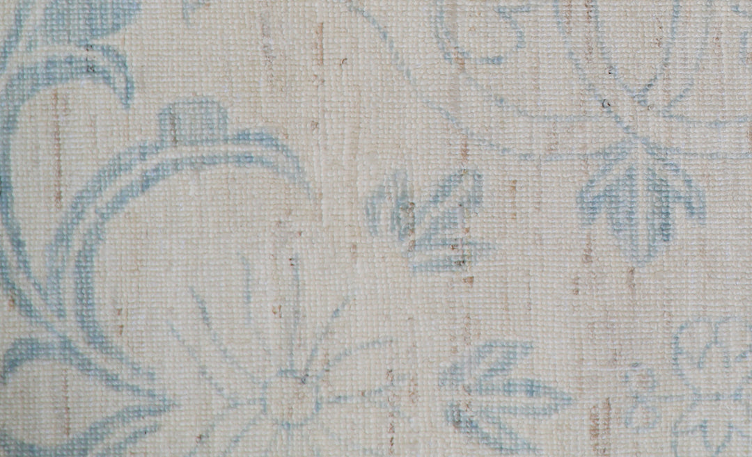 Unique hand-knotted Ariana transitional floral runner rug in soft blue and luminous ivory