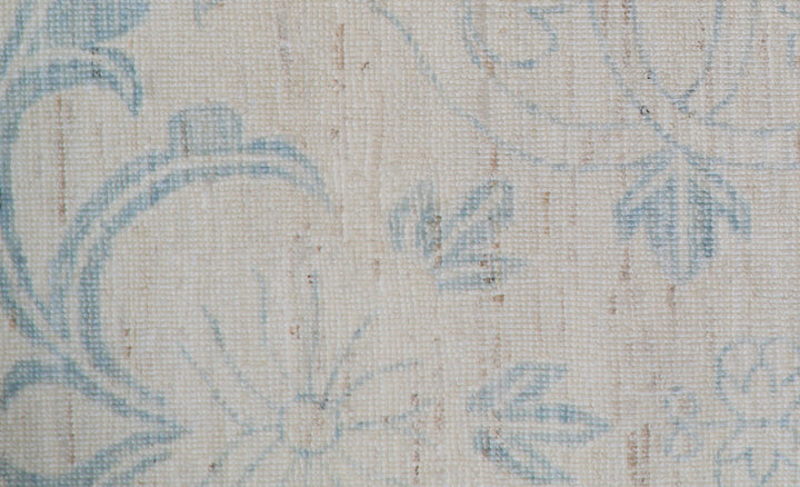 Unique hand-knotted Ariana transitional floral runner rug in soft blue and luminous ivory