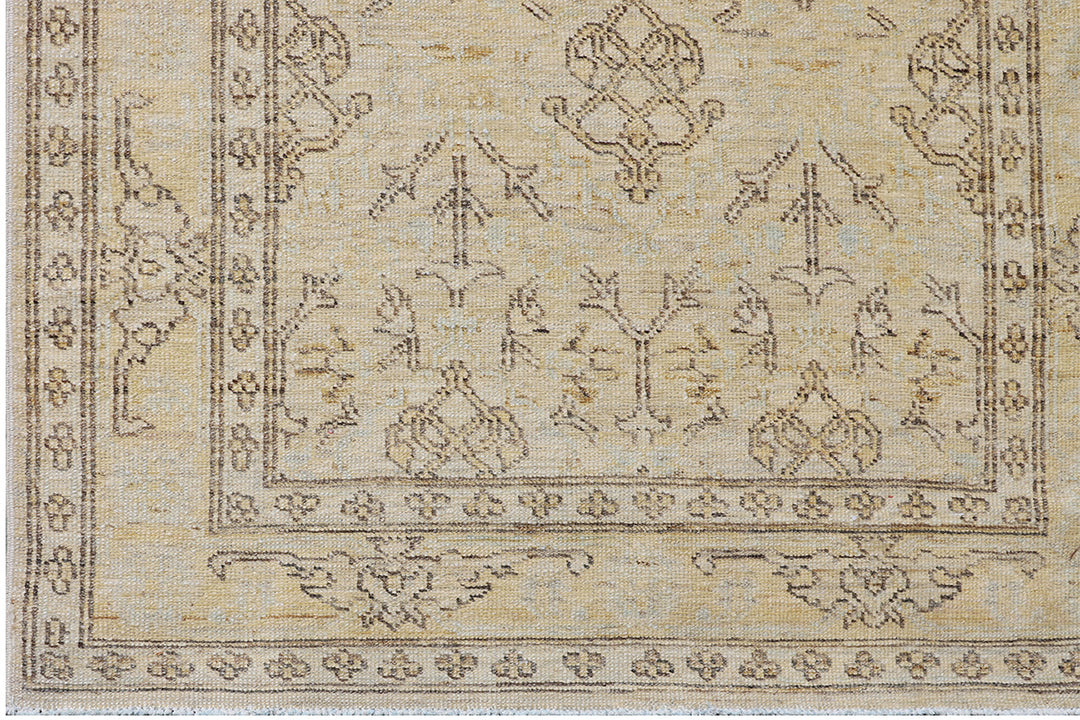 Fine hand-knotted Ariana transitional European design wool runner rug in rich camel, blue, brown, and terracotta tones