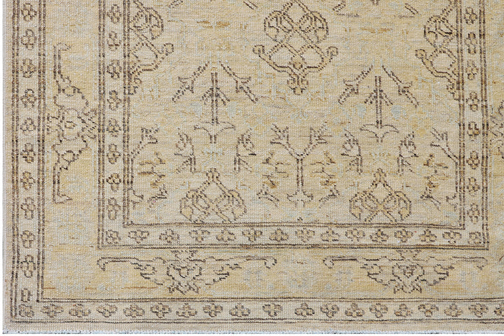 Fine hand-knotted Ariana transitional European design wool runner rug in rich camel, blue, brown, and terracotta tones